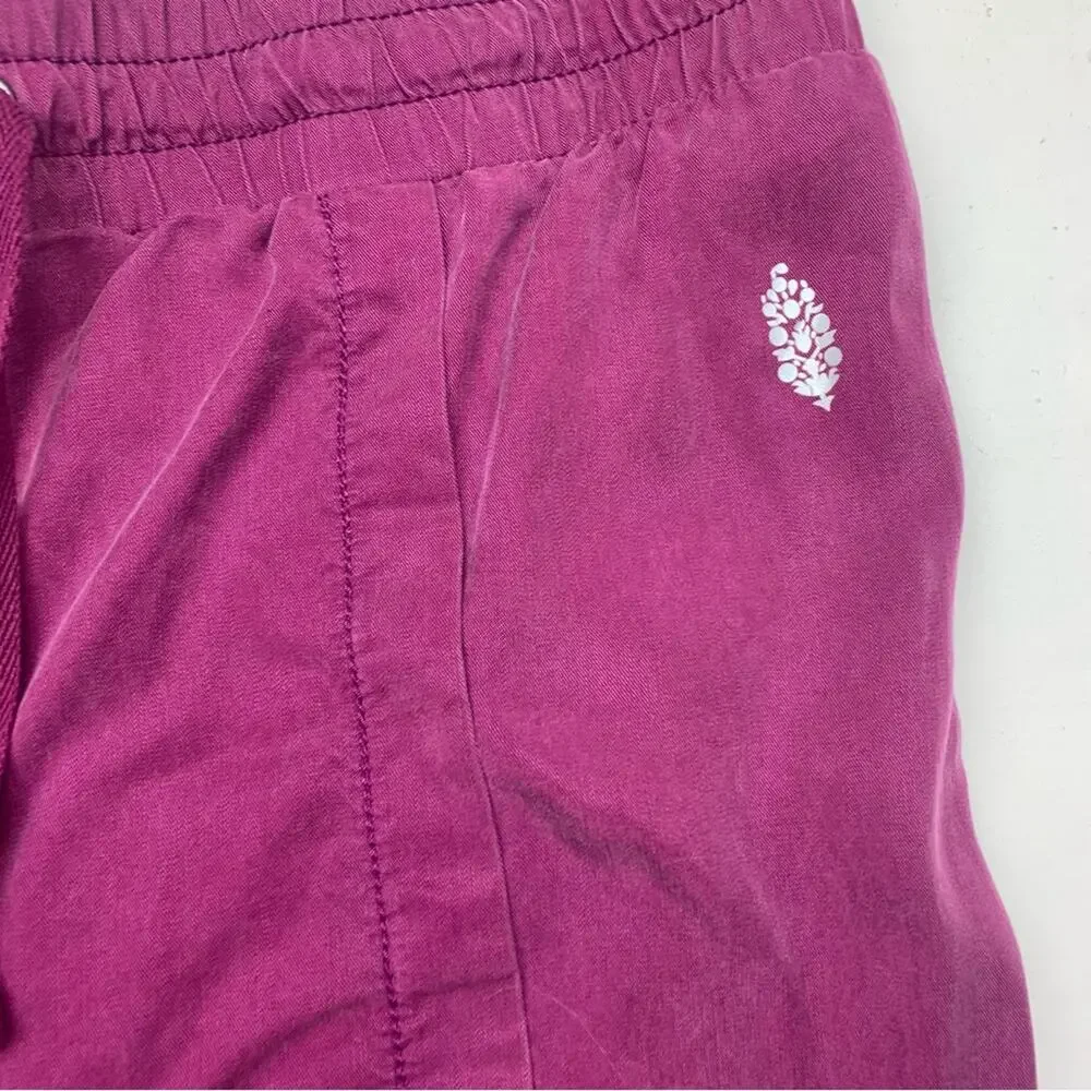 Free People movement size small abs tracker slouchy wide leg pants Pink split